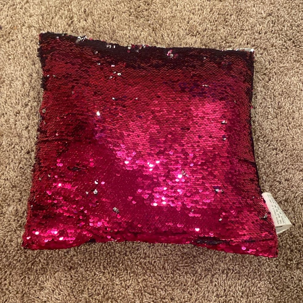 Pink flipping sequin pillow